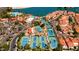 Scenic aerial view of community tennis courts surrounded by lush landscaping and beautiful homes at 1110 N Gull Haven Ct, Gilbert, AZ 85234