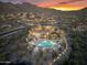 Overhead shot of community pool, clubhouse, with mountain views at 11339 E Beck Ln, Scottsdale, AZ 85255