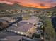Elevated view of resort-style backyard with pool, spa, and covered patio at 11339 E Beck Ln, Scottsdale, AZ 85255
