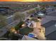 Overhead view of private backyard with pool, spa, putting green and patio with seating at 11339 E Beck Ln, Scottsdale, AZ 85255