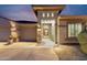Beautiful walkway leading to the front door with stone accents and manicured landscaping at 11339 E Beck Ln, Scottsdale, AZ 85255