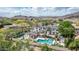 Breathtaking view of a luxurious home, pool, and lush landscaping in a beautiful desert neighborhood at 11827 S Montezuma Ct, Phoenix, AZ 85044