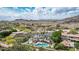 Extensive aerial view of the home and neighborhood in a desert setting at 11827 S Montezuma Ct, Phoenix, AZ 85044