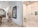 Bathroom showcasing a glass enclosed shower and marble-themed decor at 11827 S Montezuma Ct, Phoenix, AZ 85044