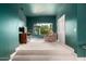 Bedroom with sitting area and outdoor views at 11827 S Montezuma Ct, Phoenix, AZ 85044