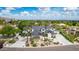 A stunning exterior elevation showcases a grand home with meticulous landscaping and a porte cochere at 11827 S Montezuma Ct, Phoenix, AZ 85044