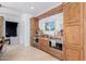 Kitchen with light wood cabinets, granite countertops, stainless appliances at 11827 S Montezuma Ct, Phoenix, AZ 85044