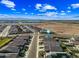 An aerial view of a planned community with desert landscaping in a suburban setting at 12472 W Kaler Dr, Glendale, AZ 85307