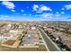 An aerial view of a well-planned community with a layout and a bright blue sky at 12472 W Kaler Dr, Glendale, AZ 85307