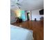 Spacious bedroom with light walls, hardwood floors, and blue accent wall at 15515 N 174Th Ave, Surprise, AZ 85388