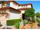 Attractive home entrance with a beautiful desert landscape design that adds curb appeal at 15515 N 174Th Ave, Surprise, AZ 85388