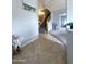 Entryway with tile flooring, staircase with wooden railing, and decor at 15515 N 174Th Ave, Surprise, AZ 85388