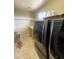 Bright laundry room with modern LG Signature washer and dryer at 15515 N 174Th Ave, Surprise, AZ 85388