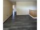 Open-concept living room with wood floors, bright and airy at 15515 N 174Th Ave, Surprise, AZ 85388