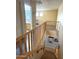 View of a staircase leading to a living space and bathroom area at 15515 N 174Th Ave, Surprise, AZ 85388