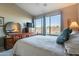 Cozy bedroom with large windows, neutral paint, carpet and ceiling fan at 16336 E Ridgeline Dr, Fountain Hills, AZ 85268