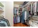 Spacious walk-in closet with custom shelving and ample storage space for clothing and accessories at 16336 E Ridgeline Dr, Fountain Hills, AZ 85268
