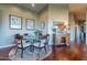 Cozy dining area with a round table, seating for six, and hardwood floors, perfect for intimate gatherings at 16336 E Ridgeline Dr, Fountain Hills, AZ 85268