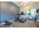 Well-equipped gym featuring a treadmill, exercise bike, and free weights for convenient workouts at 16336 E Ridgeline Dr, Fountain Hills, AZ 85268