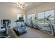 Bright gym with natural light, providing a motivating space for fitness and wellness activities at 16336 E Ridgeline Dr, Fountain Hills, AZ 85268