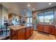 Open kitchen featuring a spacious island, stainless steel appliances, and a view of the living area at 16336 E Ridgeline Dr, Fountain Hills, AZ 85268