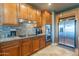 Modern kitchen with stainless steel appliances, granite countertops, and ample cabinet space, offering style and functionality at 16336 E Ridgeline Dr, Fountain Hills, AZ 85268