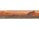 Picturesque mountain range with scenic views under a vibrant sunset sky at 16336 E Ridgeline Dr, Fountain Hills, AZ 85268