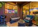 Outdoor patio with comfortable seating, a grill, and views into the house, perfect for relaxing and entertaining at 16336 E Ridgeline Dr, Fountain Hills, AZ 85268