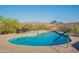 Beautiful pool with mountain views and comfortable seating area perfect for relaxation and outdoor enjoyment at 16336 E Ridgeline Dr, Fountain Hills, AZ 85268
