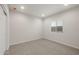 Bright bedroom features plush carpet, recessed lighting, and a window at 17758 W Getty Dr, Goodyear, AZ 85338