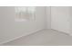 Bedroom showcasing neutral carpet, white walls, and a closet with sliding doors at 17764 W Getty Dr, Goodyear, AZ 85338
