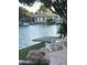 Waterfront backyard with a patio for lakeside relaxation and enjoyment at 1833 W Mead Pl, Chandler, AZ 85248