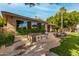 Outdoor kitchen and landscaped backyard, perfect for entertaining or relaxing at 1833 W Mead Pl, Chandler, AZ 85248