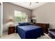Comfortable bedroom with ceiling fan, big window, and neutral finishes at 1833 W Mead Pl, Chandler, AZ 85248