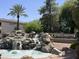 Beautiful community waterfall feature and sign provides an inviting welcome at 1833 W Mead Pl, Chandler, AZ 85248