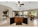Spacious kitchen provides dual dishwashers, tile flooring, a center island, and an eat-in area at 1833 W Mead Pl, Chandler, AZ 85248