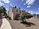 View of townhouse exterior and fenced in backyard at 18820 N 34Th Ln # 1, Phoenix, AZ 85027