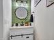 Updated powder room vanity, sink, faucet, light fixtures and framed mirror at 18820 N 34Th Ln # 1, Phoenix, AZ 85027