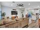 Open-concept living room flowing seamlessly into the kitchen and dining area at 18820 N 34Th Ln # 1, Phoenix, AZ 85027