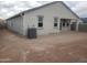 New home backyard featuring gravel surface with covered patio attached to the house at 18823 E Bruno Dr, Gold Canyon, AZ 85118