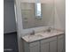 Bathroom features a double vanity with a large mirror and bright lighting at 18823 E Bruno Dr, Gold Canyon, AZ 85118