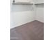 An organized walk-in closet, featuring shelving and rod for hanging clothing at 18823 E Bruno Dr, Gold Canyon, AZ 85118