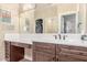 Stylish bathroom with a spacious vanity, ample lighting, and a sleek walk-in shower at 18934 E Happy Rd, Queen Creek, AZ 85142