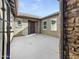Private courtyard with a gated entrance, stone accents, and a welcoming front door at 20075 E Kestrel St, Queen Creek, AZ 85142