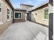 A private courtyard with stone accents, leading to a gated entrance of the home at 20075 E Kestrel St, Queen Creek, AZ 85142