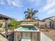 Backyard hot tub surrounded by mature landscaping, offering a private and relaxing outdoor oasis at 20075 E Kestrel St, Queen Creek, AZ 85142
