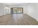 Open living room with tile floors and sliding glass doors, offering plenty of natural light at 20075 E Kestrel St, Queen Creek, AZ 85142