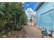 Fenced-in backyard area with gravel and vegetation providing a private outdoor space at 201 S Greenfield Rd # 144, Mesa, AZ 85206