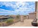 Spacious rooftop patio offering stunning neighborhood views and a relaxing outdoor setting at 2055 W Jasper Butte Dr, Queen Creek, AZ 85144