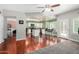 Open kitchen with white cabinets, stainless steel appliances, and dark countertops at 2131 E New Bedford Dr, Gilbert, AZ 85234